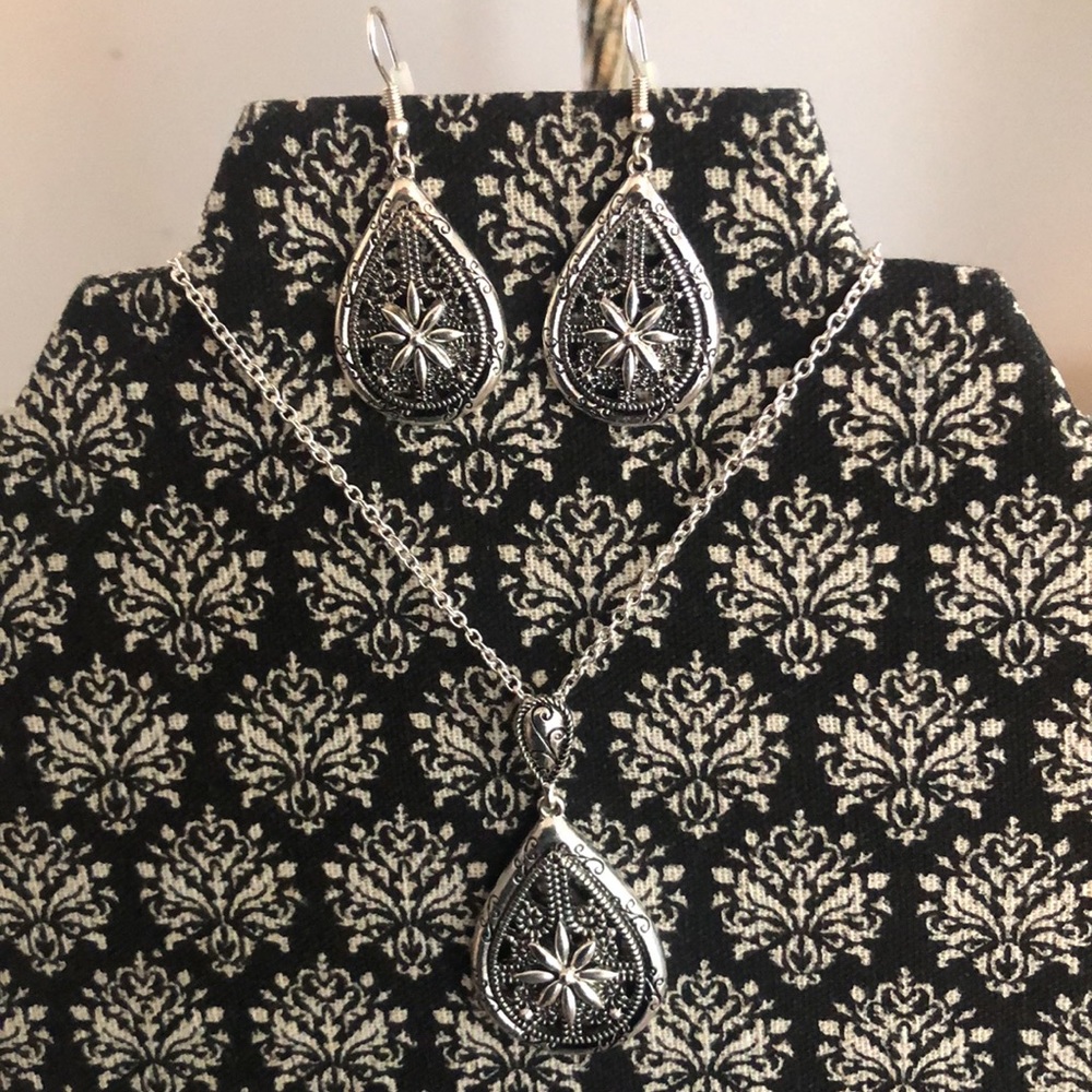 Silver necklace and earrings